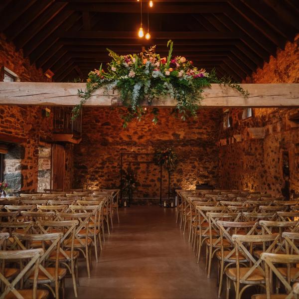 indoor ceremony space in the old mill at cardney steading
