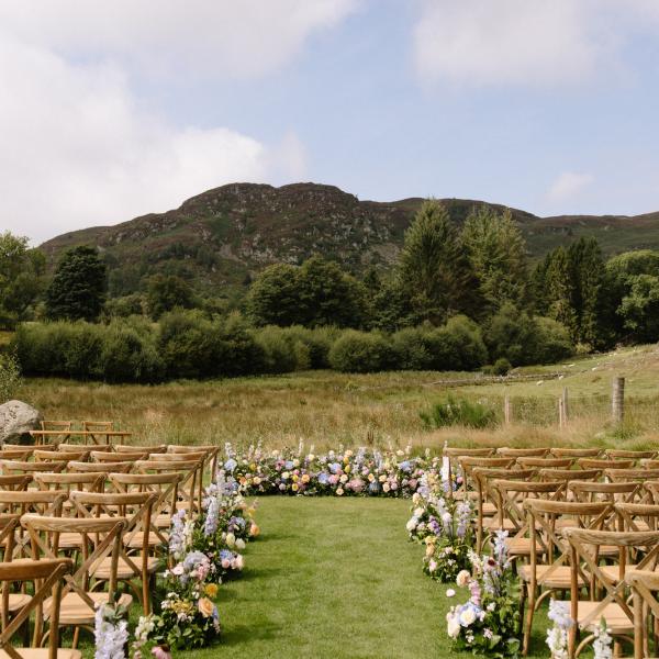 chairs on lawn at loch side wedding cardney steading