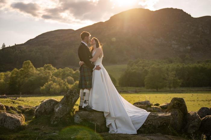 bride and groom celebrating at cardney steading wedding venue in perthshire