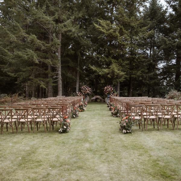chairs in woodland wedding ceremony carney steading