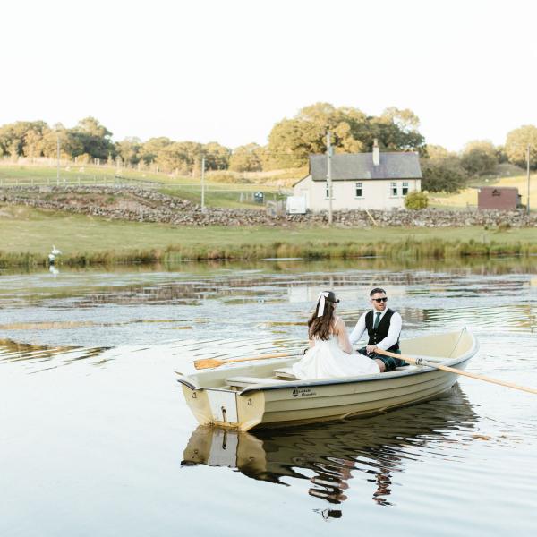 isla and robbie boat in the loch