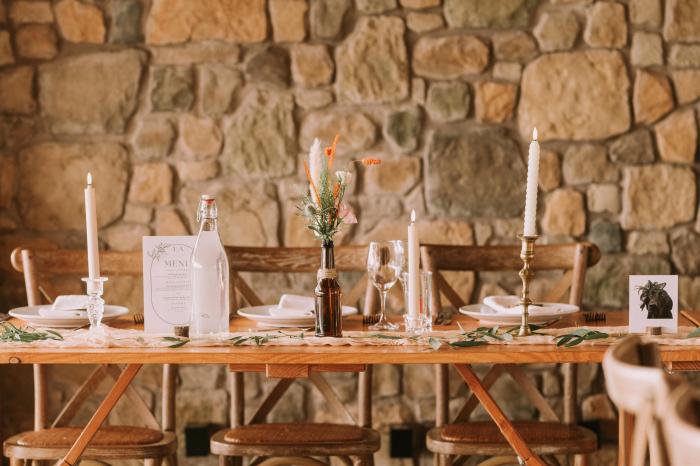 Wedding tables and chairs set for reception at Cardney Steading
